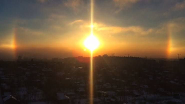 Sunset over a landscape with a bright sun and halo effects. | Statement Ring | Asymmetrical Ring | neo jewelry