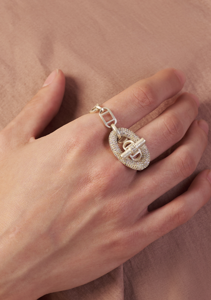 Hand wearing a silver ring with a decorative design | Statement Rings | neo jewelry