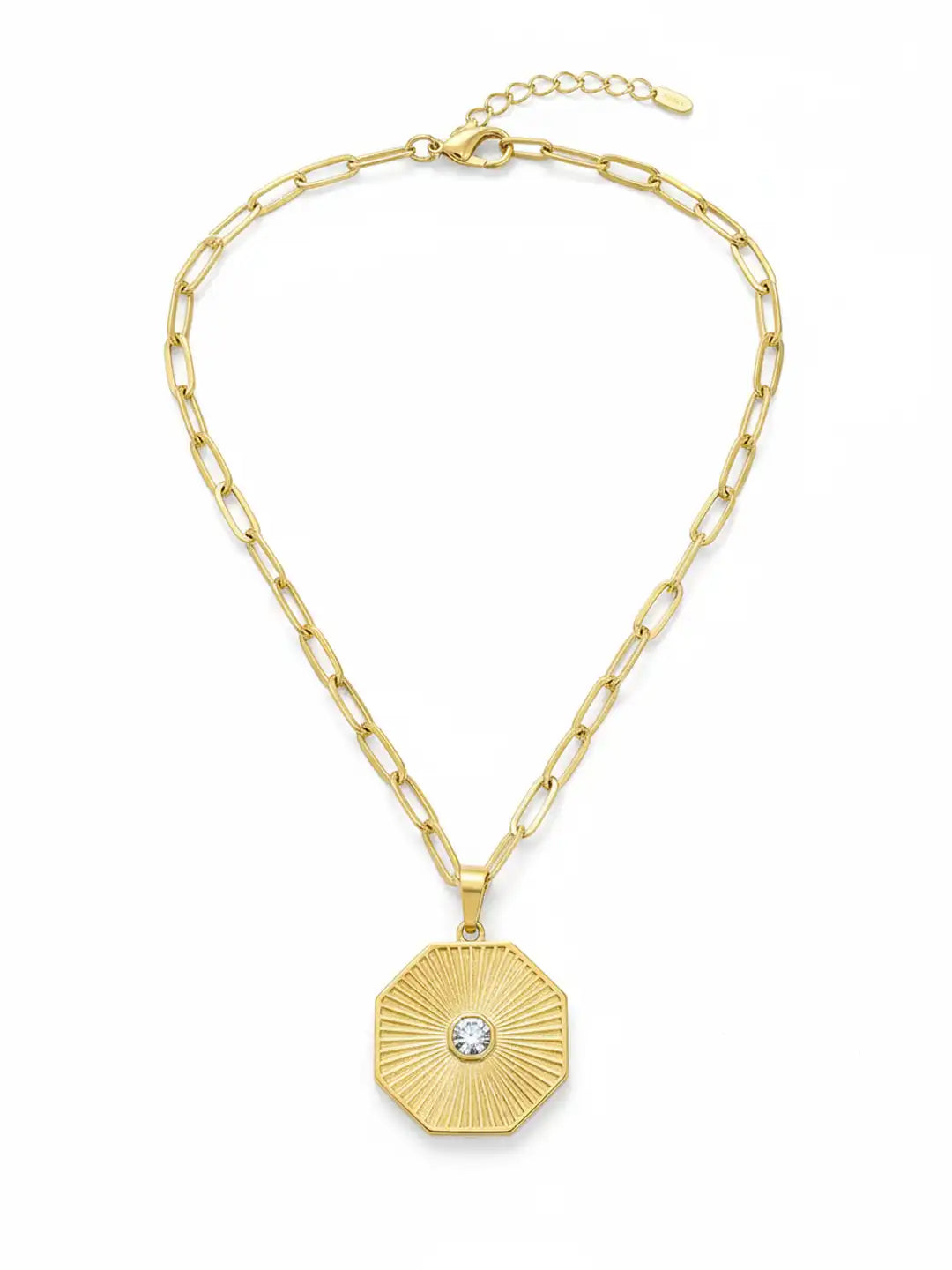 Gold necklace with a hexagonal pendant.