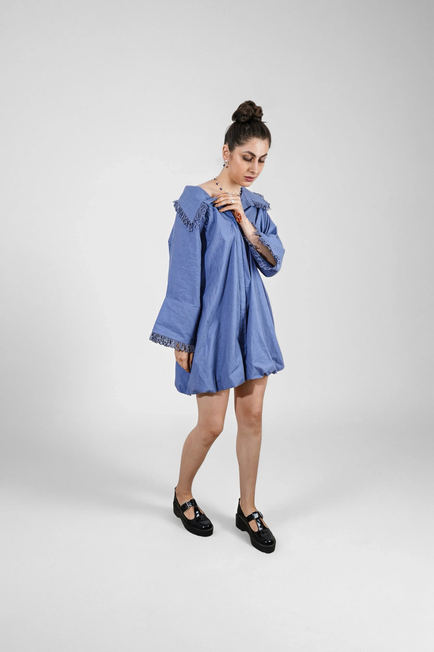 Woman wearing a blue dress | Women Dresses | Pret Clothes | nEo Clothes