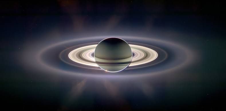 Artistic rendering of Saturn with its rings in space | Statement Earring | neo jewelry
