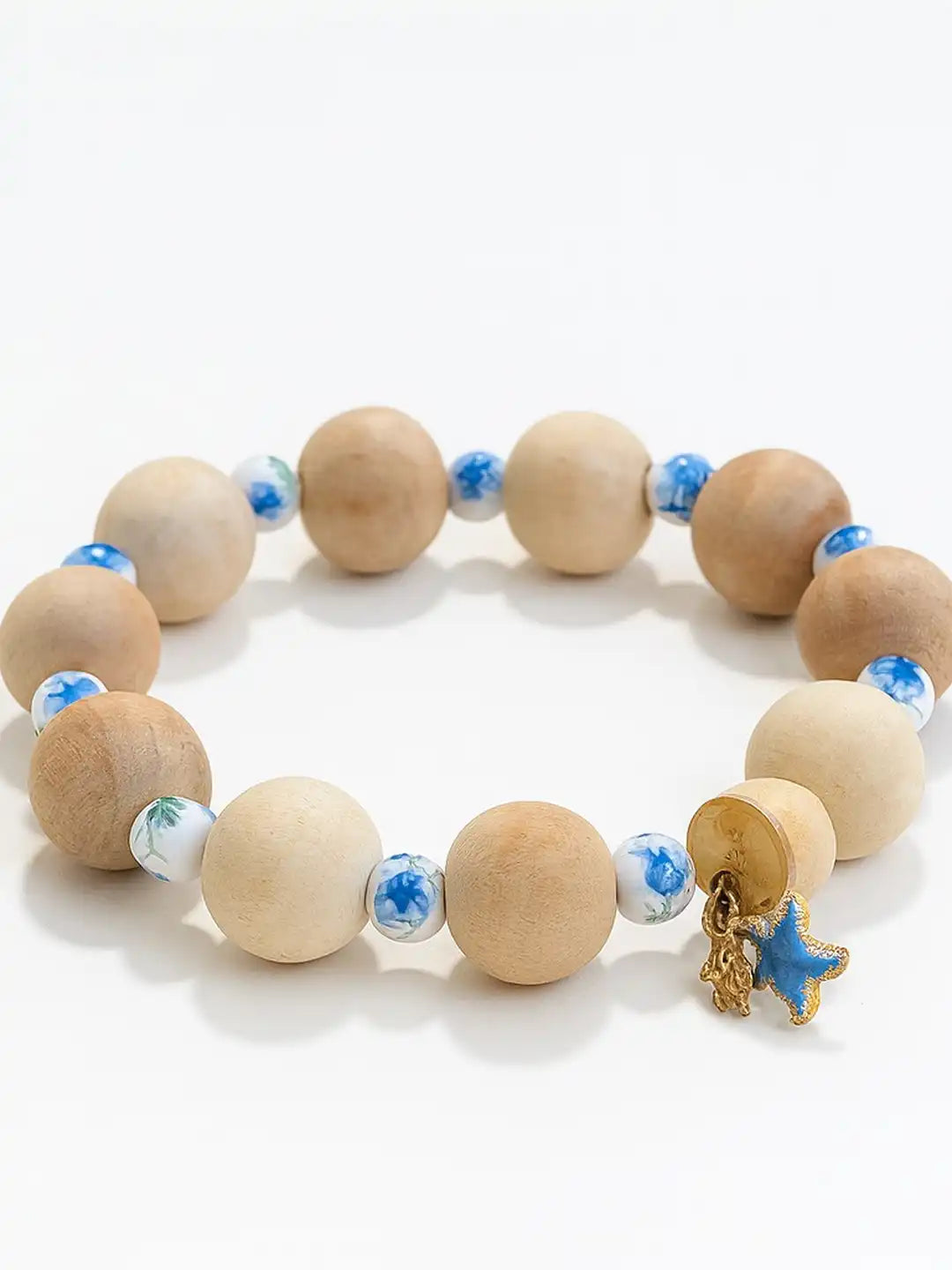 Wooden beaded bracelet with blue accents and a gold charm for Pet