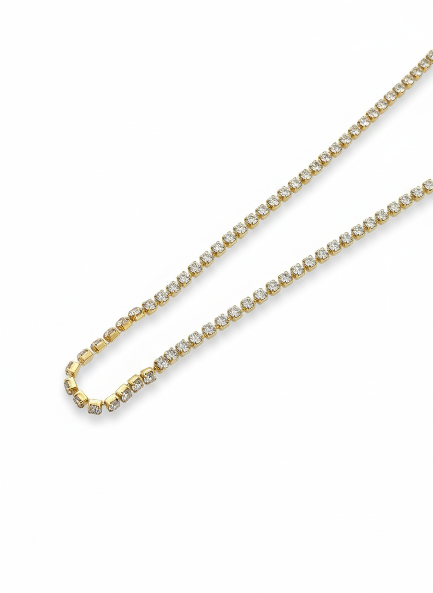 Gold crystal necklace featuring high-shine round stones for a timeless luxury look.