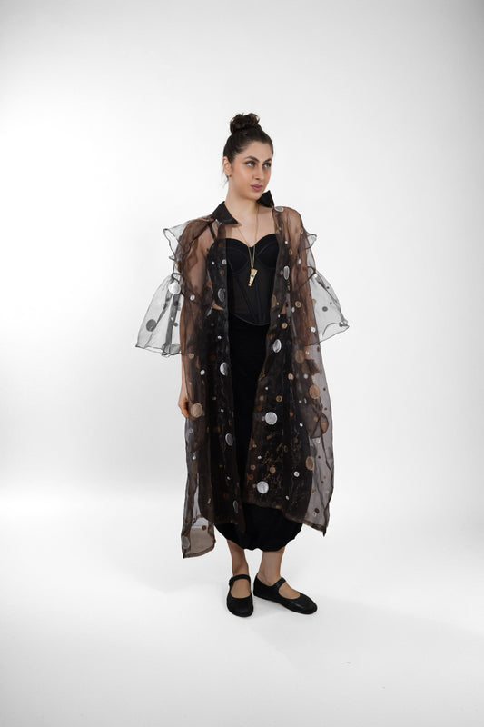 Celestial Dust Overlay : Woman wearing a sheer black overlay with white polka dots over a black dress - near Earth object | Women's Overlay | Jacket & Camisole | Pret Clothes | nEo Clothes.