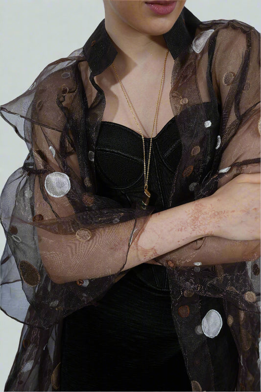 Celestial Dust Overlay : Person wearing a sheer black overlay outfit with a gold necklace - near Earth object | Women's Overlay  | Jacket & Camisole | Pret Clothes | nEo Clothes.