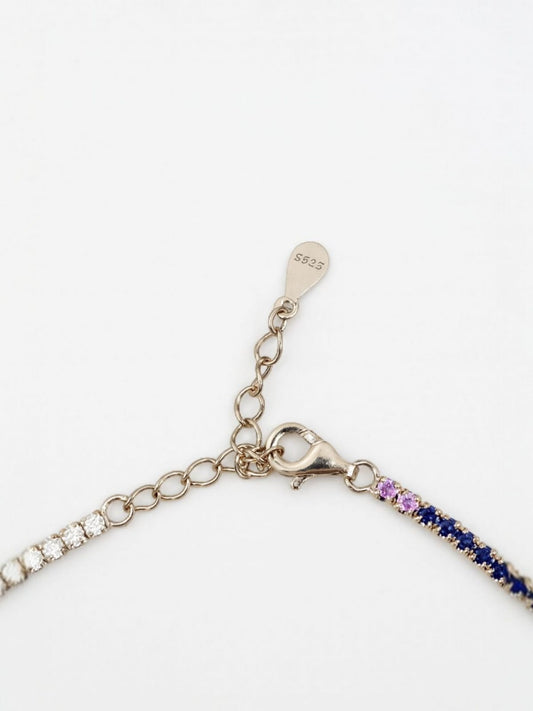 Close-up of rainbow stone bracelet showing gradient detailing and adjustable clasp.