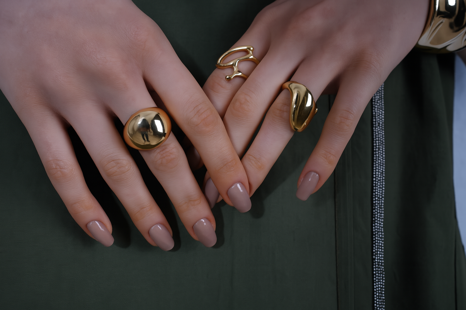 Close-up of hands wearing gold rings | Statement Ring | Asymmetrical Ring  | neo jewelry 