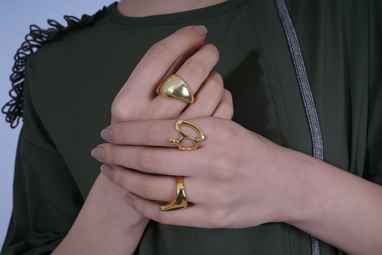 Close-up of hands wearing three gold rings  | Statement Ring | Asymmetrical Ring  | neo jewelry 