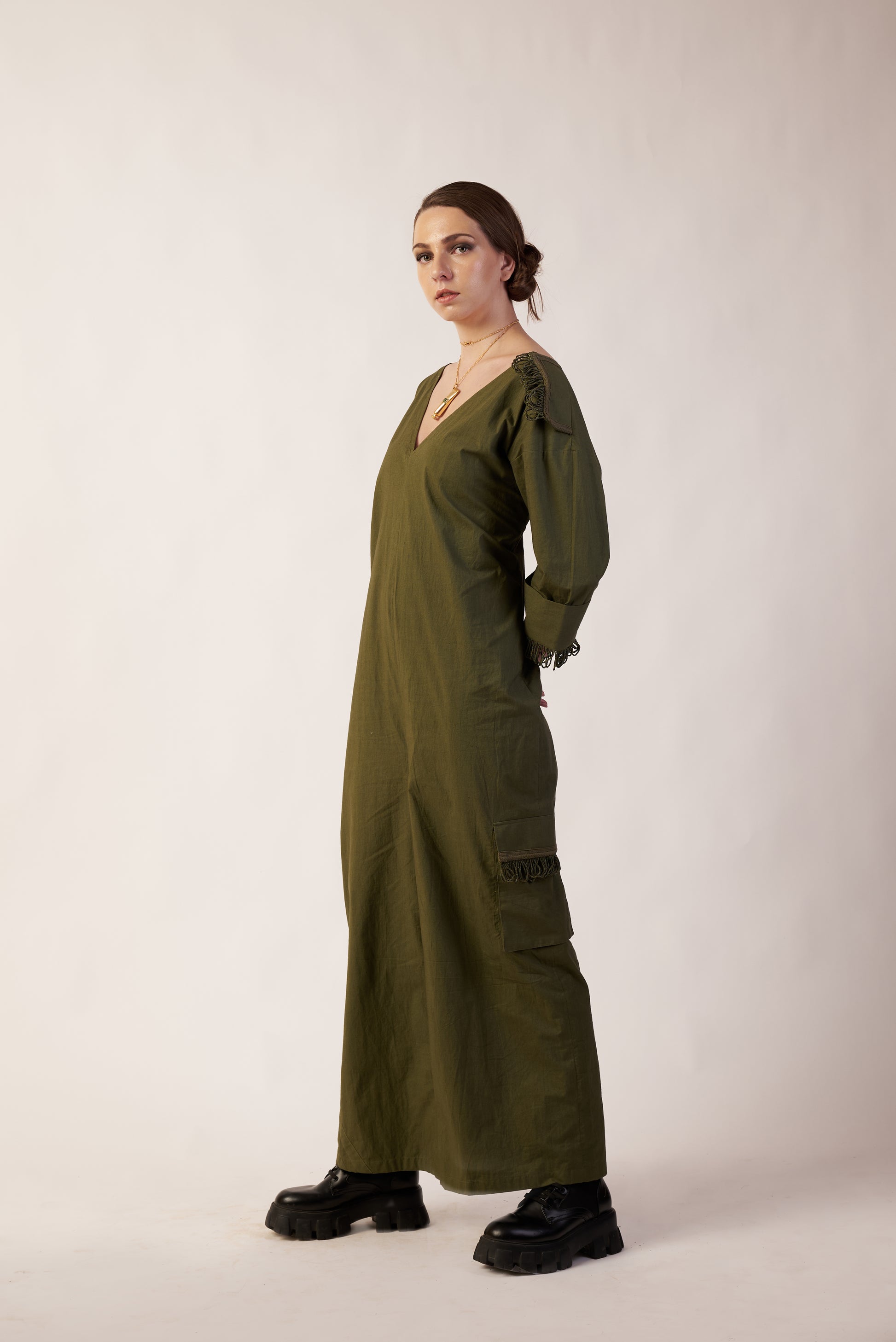 Cosmic Eclipse Jumpsuit : Woman wearing a long green dress with puffed sleeves - near Earth object | Women Jumpsuit | Pret Clothes | nEo Clothes.