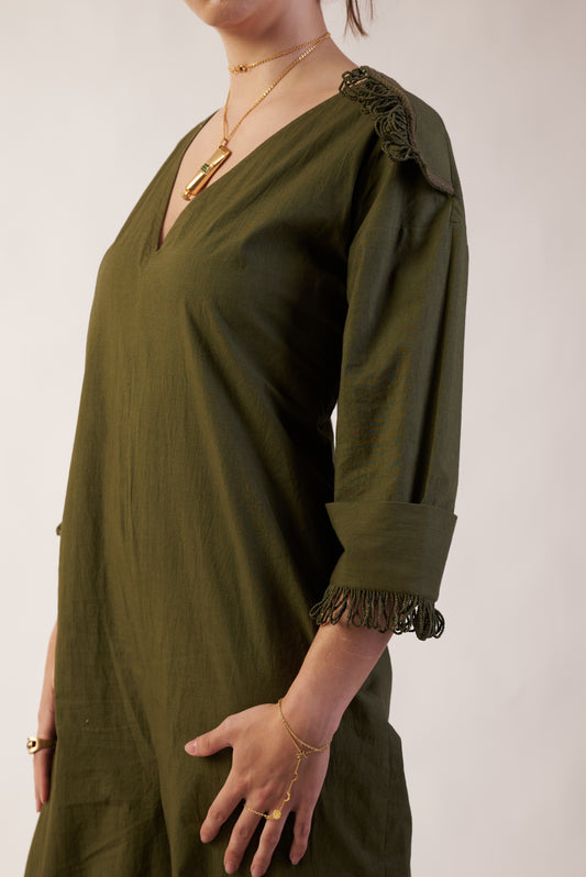 Cosmic Eclipse Jumpsuit : Person wearing an olive green dress with long sleeves and ruffled shoulders - near Earth object | Women Jumpsuit | Pret Clothes | nEo Clothes.