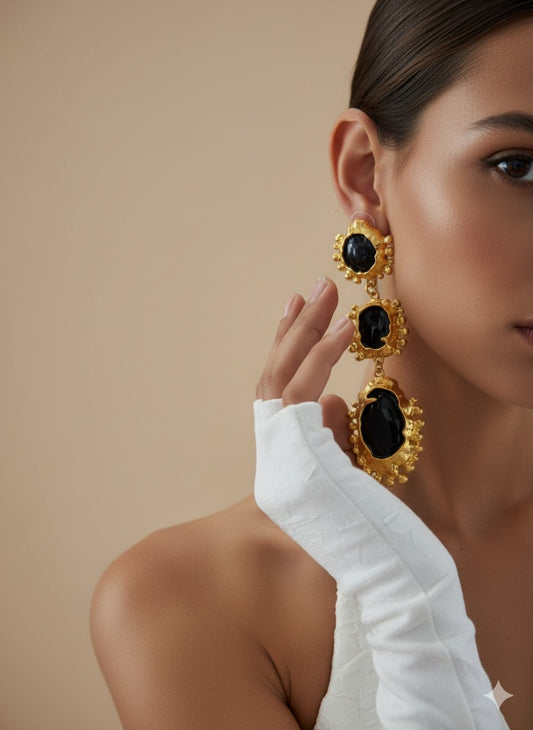 Model wearing gold textured black cameo earrings – elegant and bold statement jewellery by Near Earth Object.