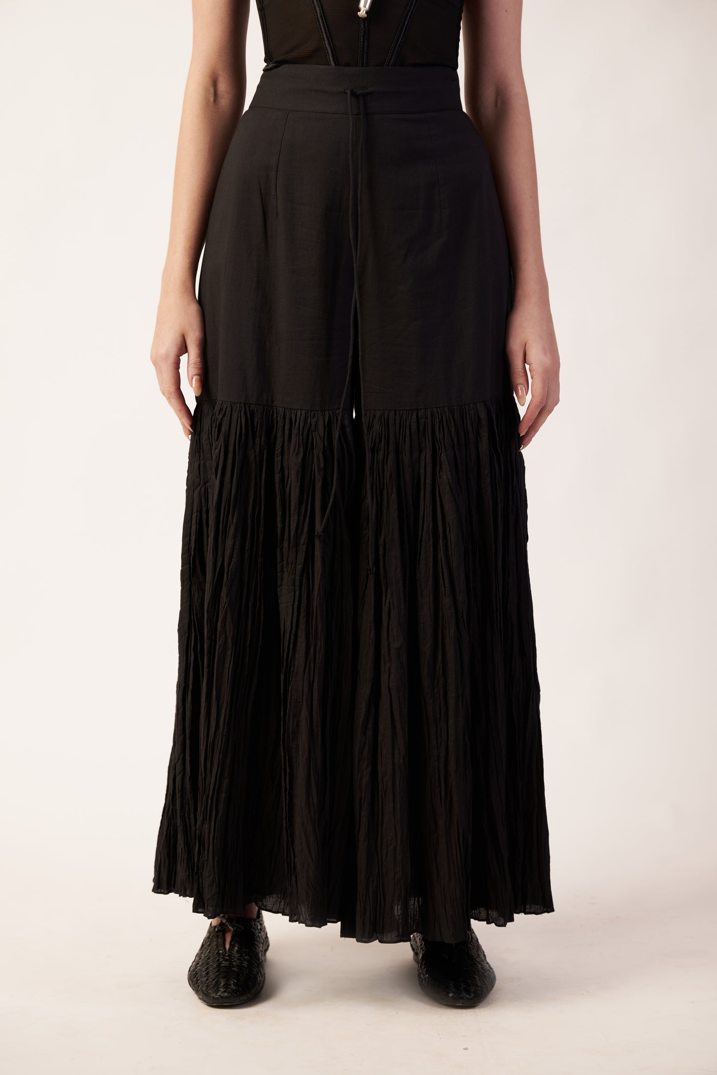 Eclipse Veil Pant : Black pleated Pant worn by a person - near Earth object | Women's Pants | Bottoms | Pret Clothes | nEo Clothes.
