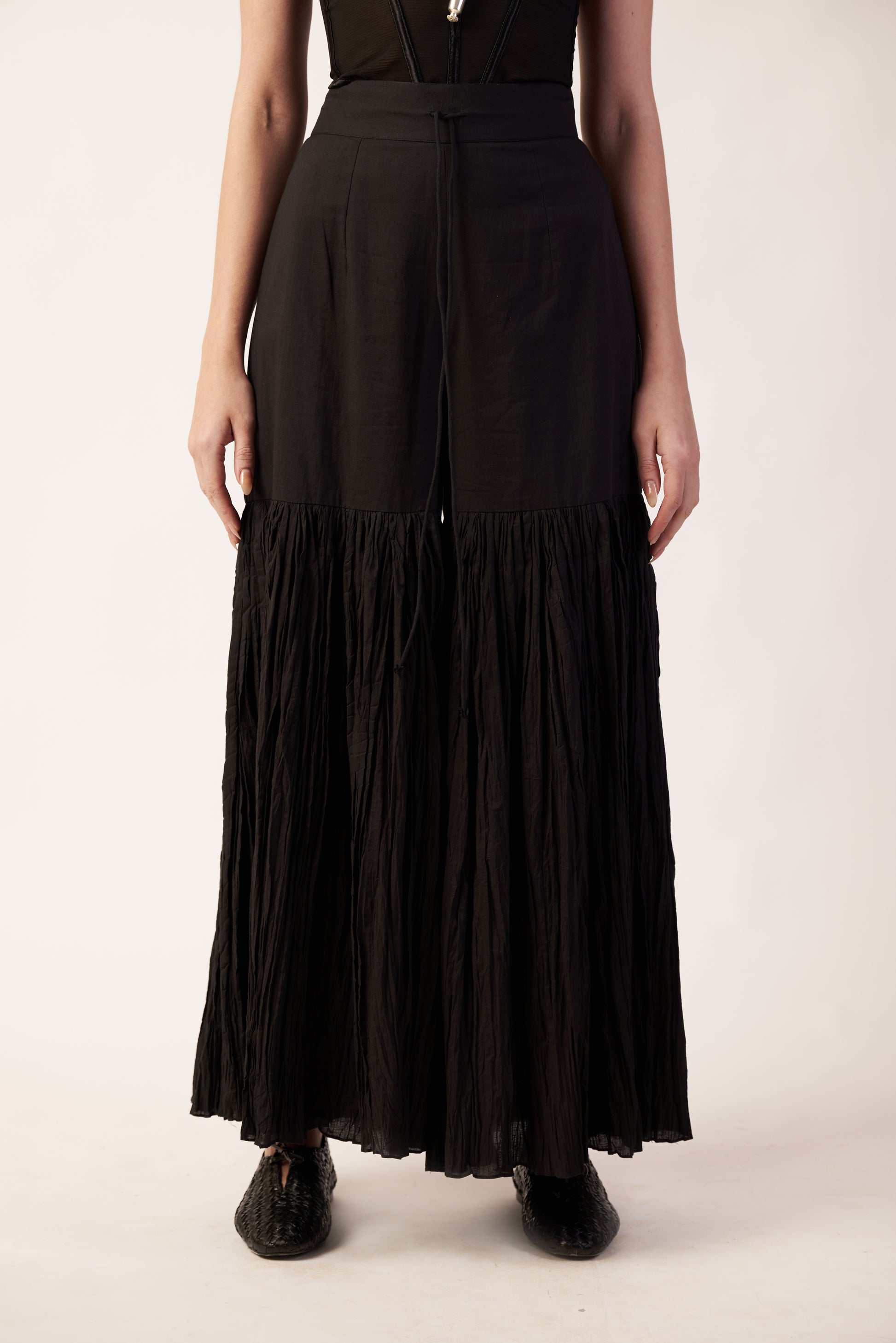 Eclipse Veil Pant : Black pleated Pant worn by a person - near Earth object | Women's Pants | Bottoms | Pret Clothes | nEo Clothes.