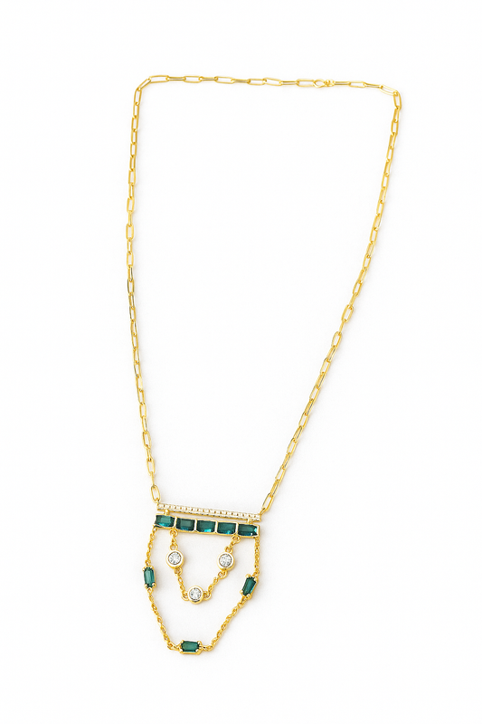 Gold layered necklace featuring emerald green baguette stones and double-chain design – statement modern neckpiece by Near Earth Object.