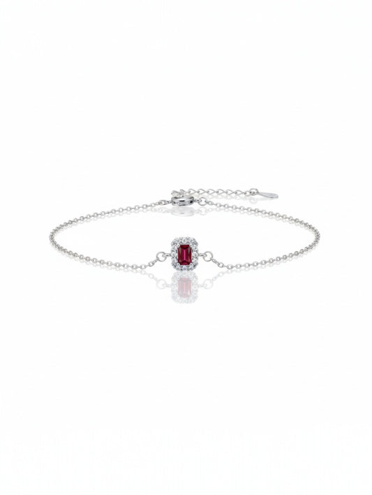 Silver bracelet with emerald-cut ruby gemstone in a double halo crystal setting – premium gemstone wristwear by Near Earth Object.