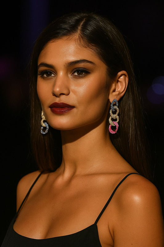 Model wearing multicolor crystal link earrings in futuristic corridor – vibrant statement jewellery by Near Earth Object.