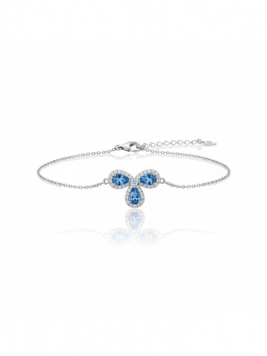 Silver bracelet featuring three blue oval gemstones in a halo setting – premium handcrafted gemstone jewellery by Near Earth Object.