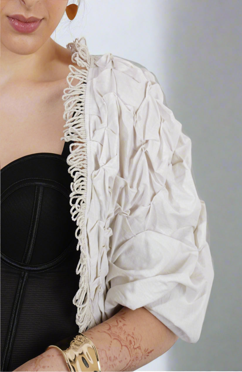Luna Texture Shrug : Woman wearing a white textured shrug over a black top - near Earth object | Women's Shrug | Jacket | Pret Clothes | nEo Clothes.
