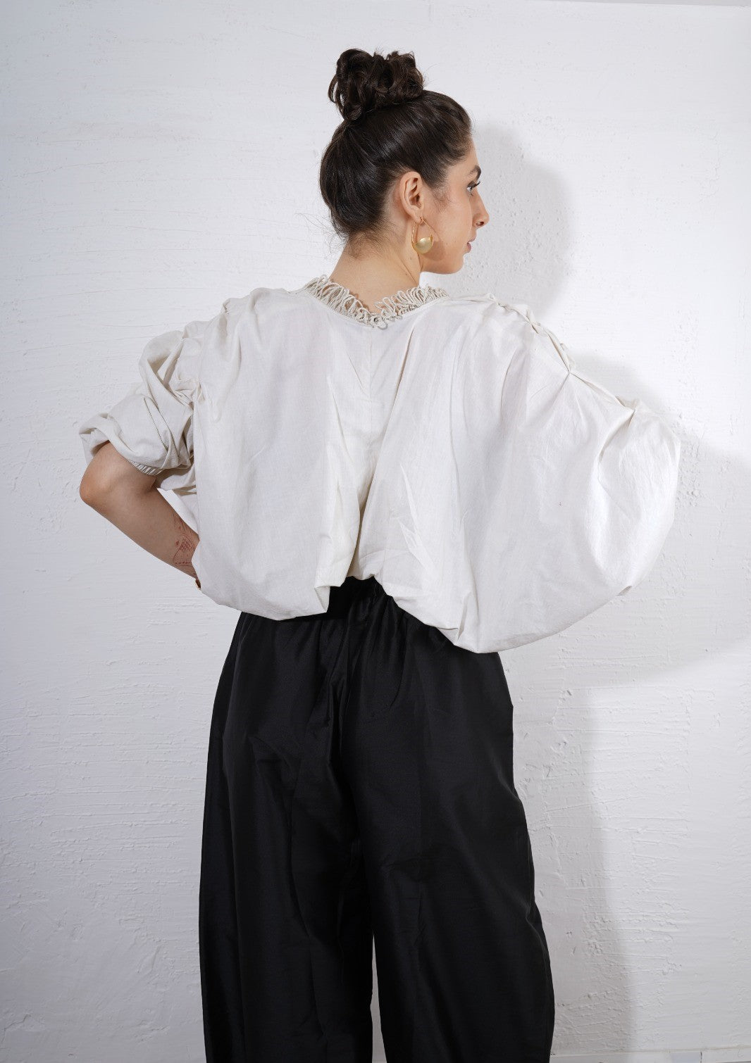 Luna Texture Shrug : Person wearing a white Shrug with puffed sleeves and black pants - near Earth object | Women's Shrug | Jacket | Pret Clothes | nEo Clothes.