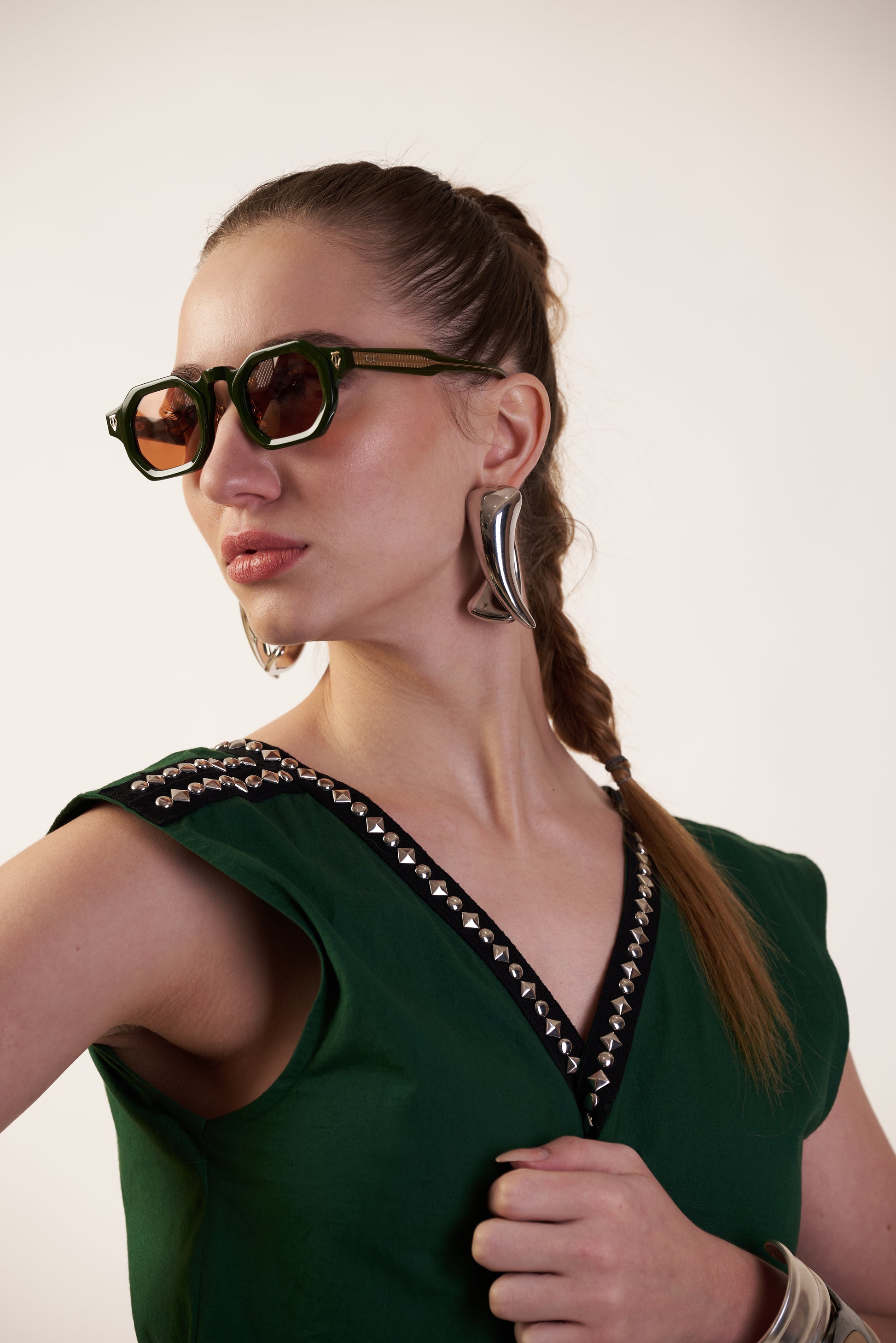 Lunar Drape Jumpsuit : Woman wearing sunglasses and a green top with decorative details  | Women Jumpsuit | Pret Clothes | nEo Clothes.