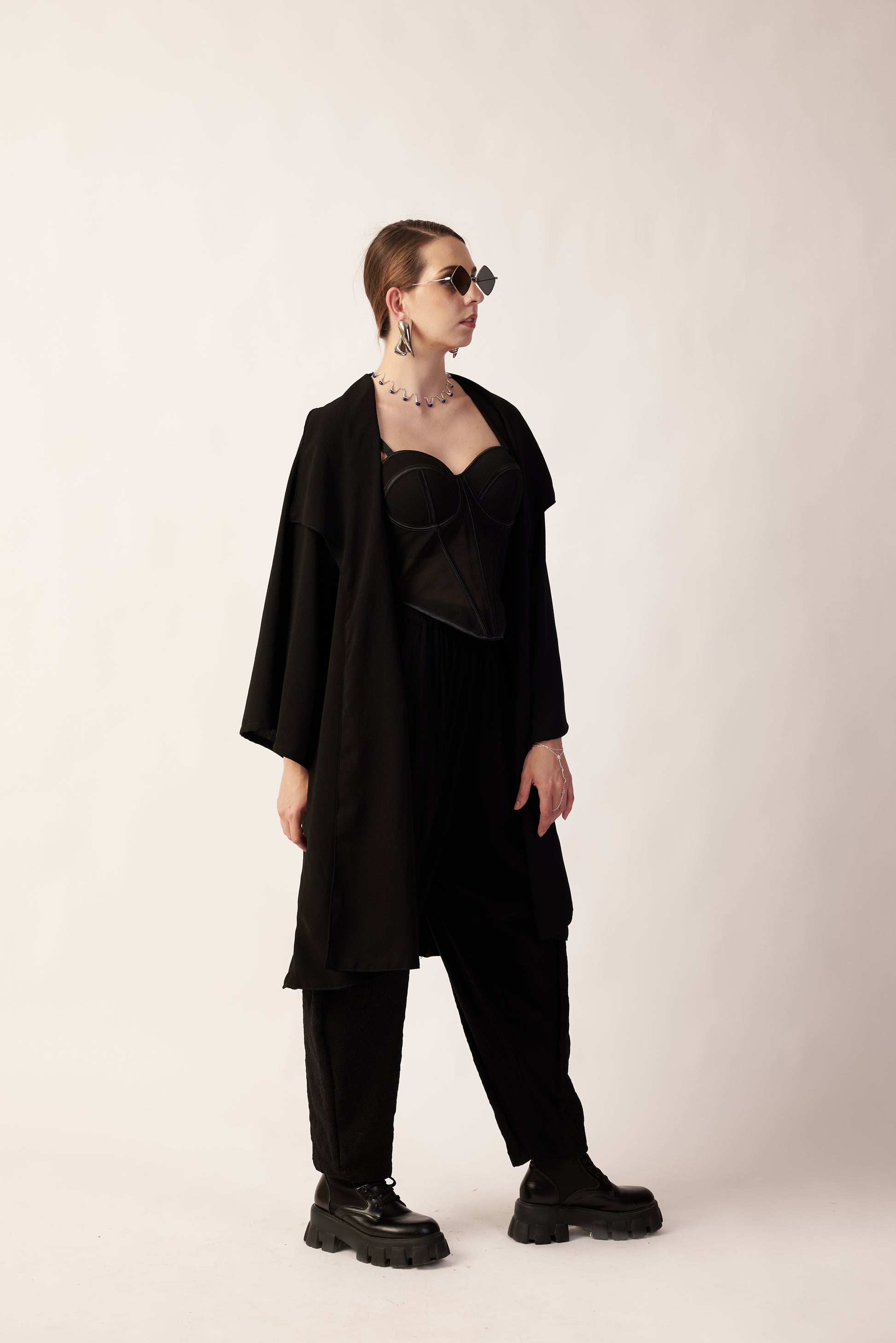 Lunar Eclipse Set : Person wearing a black outfit with a draped top and wide-leg pants - near Earth object | Women Co-ord Set | Pret Clothes | nEo Clothes.