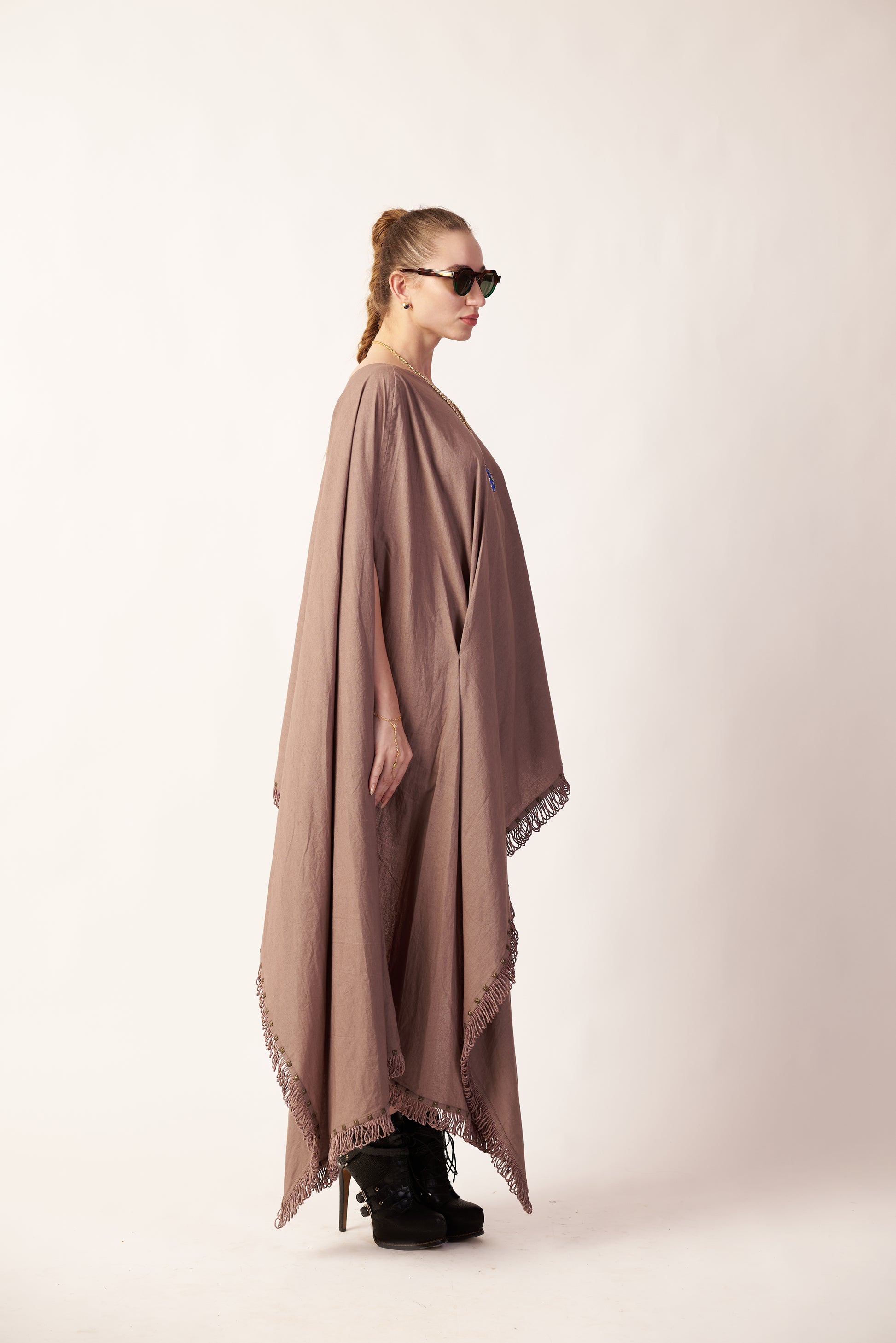 Moondust Mirage : Woman wearing a beige poncho - near Earth object | Women Co-ord Set | Pret Clothes | nEo Clothes.