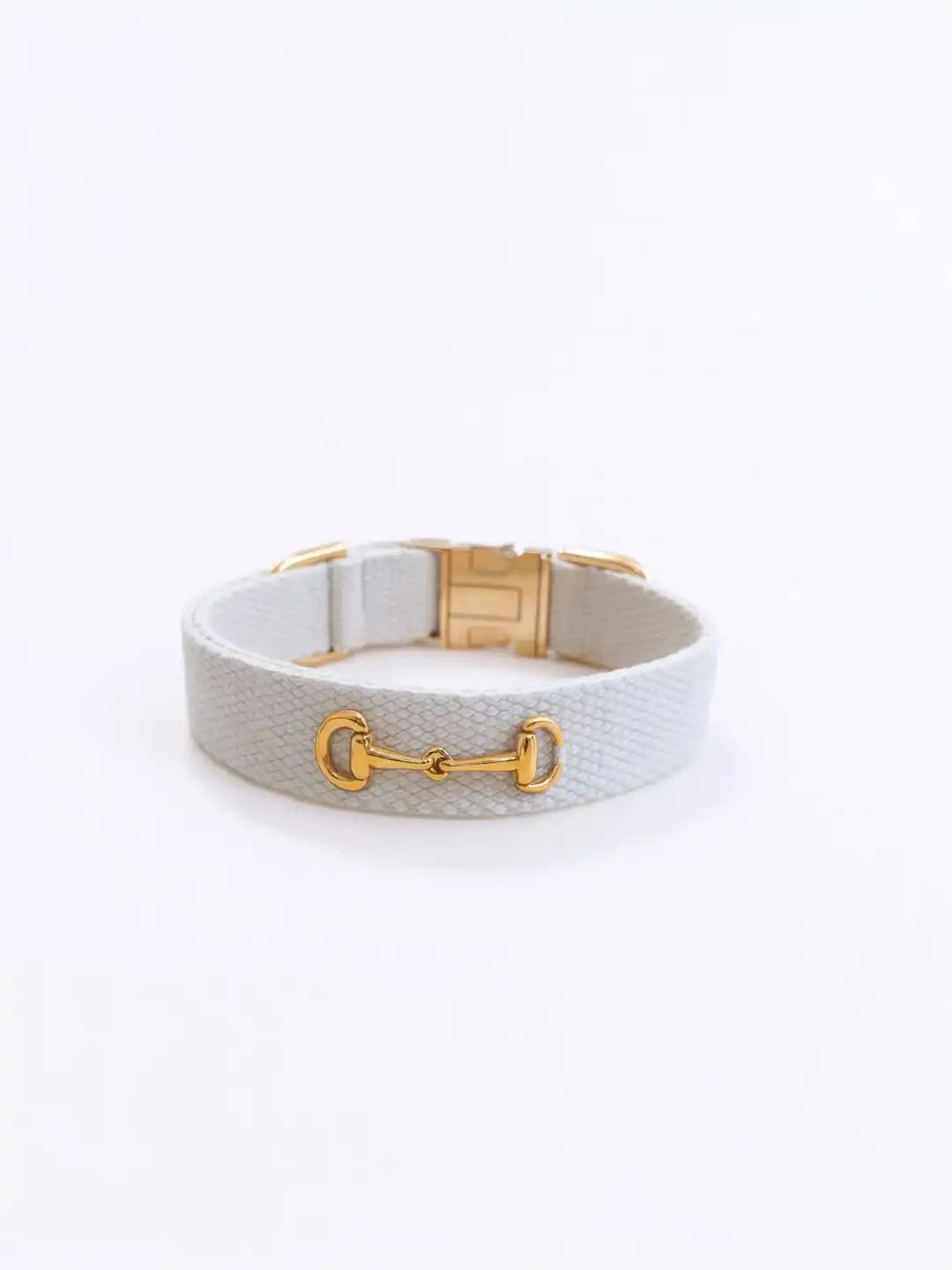 White woven bracelet with gold clasp 