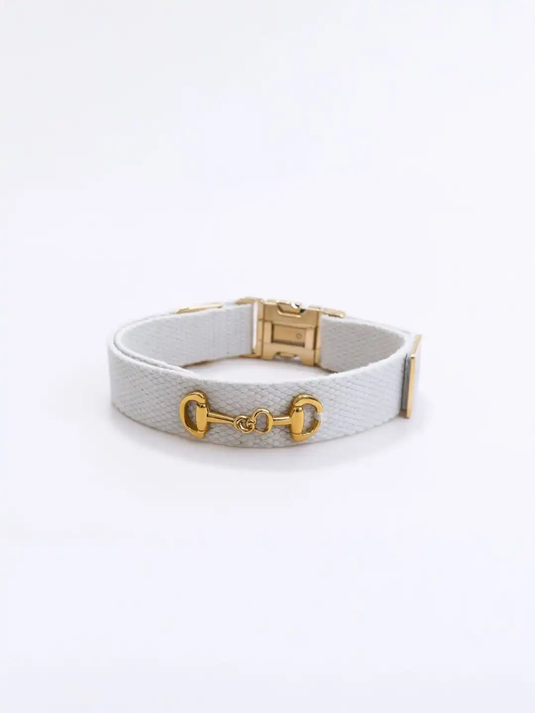 White leather bracelet with gold hardware