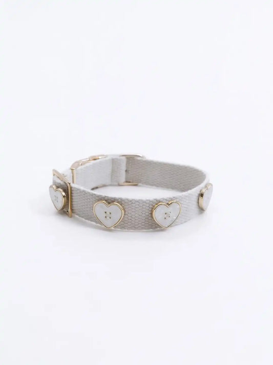 Gray dog collar with heart-shaped designs 