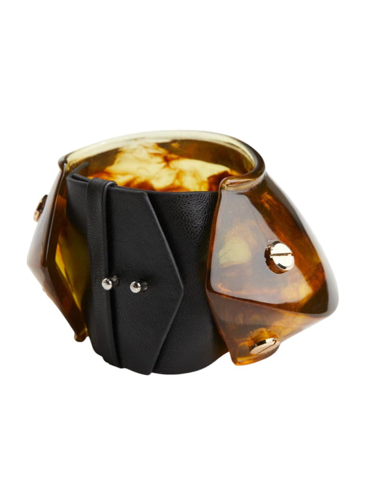 Sculptural tortoiseshell cuff bracelet with black leather panels and metallic accents – contemporary accessory by Near Earth Objec.