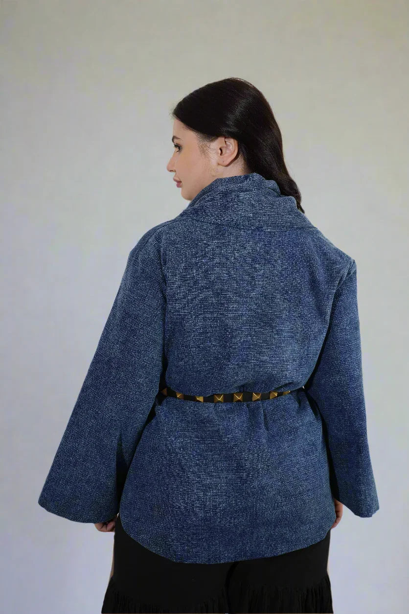 Person wearing a blue textured jacket with a belt | Women's Jacket | Camisole & Overlay | Pret Clothes | nEo Clothes.
