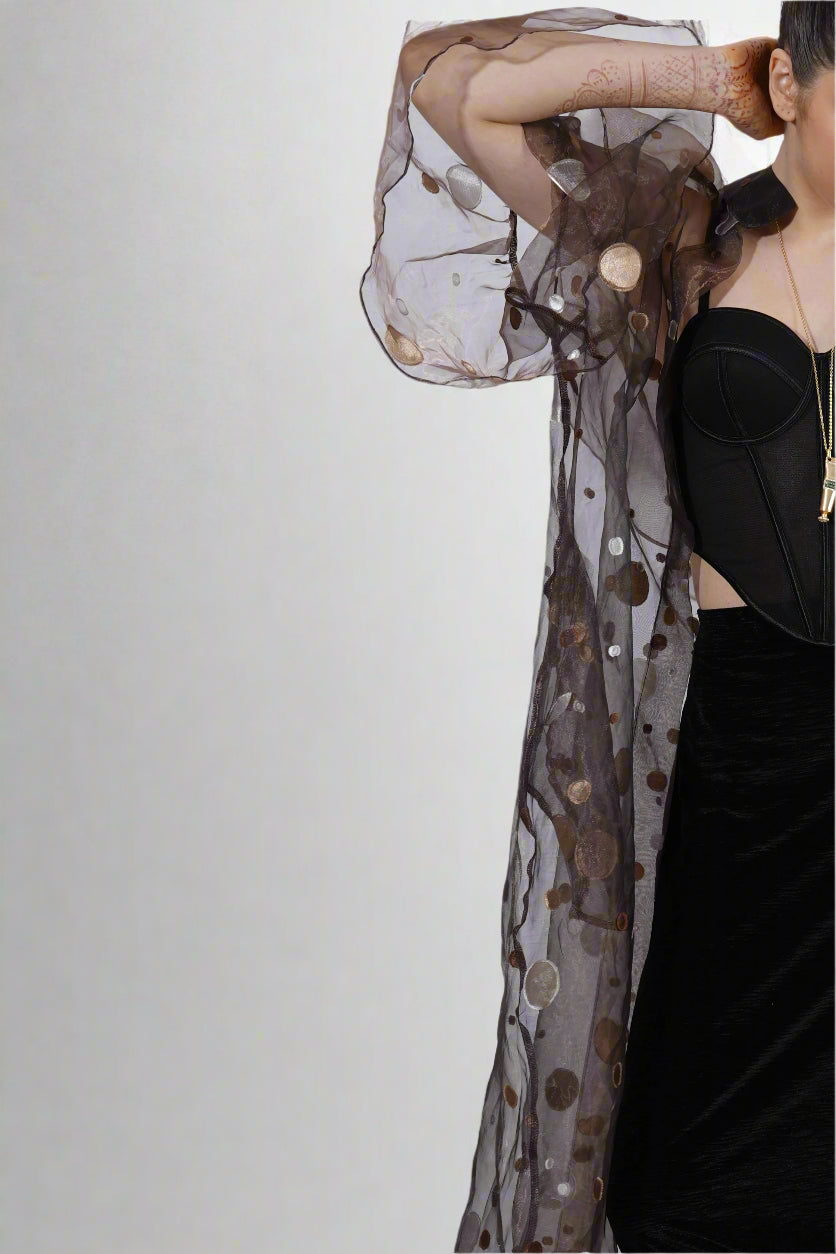 Person wearing a sheer, patterned overlay | Women's Overlay & Camisole | Jacket | Pret Clothes | nEo Clothes.