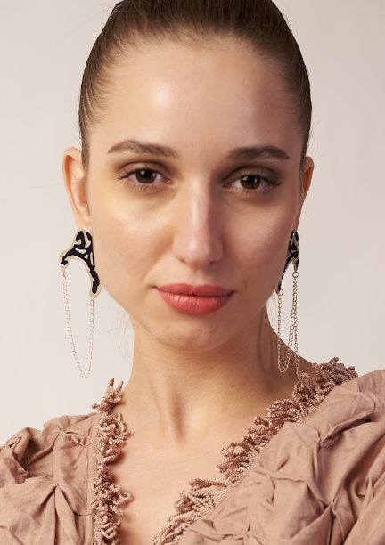 Woman wearing large, dangling earrings | Statement Ear Cuffs | neo jewelry 