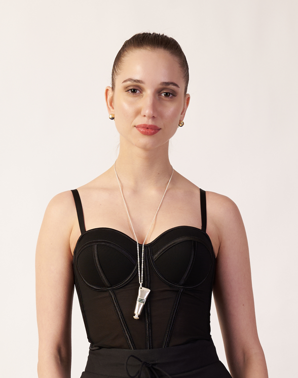 Woman wearing a black dress with a unique design Necklace  | Statement Necklace & Chokers  | neo jewelry 