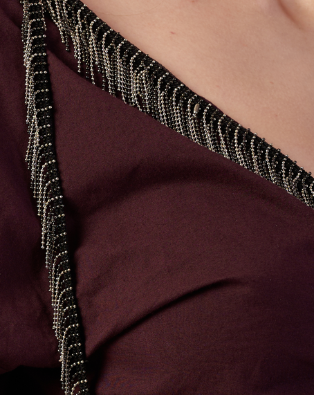 Close-up of a Coca Cola with intricate beaded detailing.  | Women Dresses | Pret Clothes | nEo Clothes.