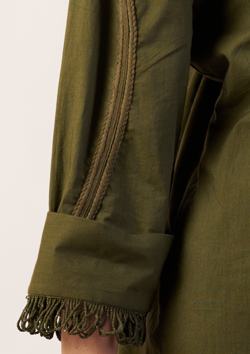 Close-up of a green jacket with fringed cuffs | Women Jumpsuit | Pret Clothes | nEo Clothes.