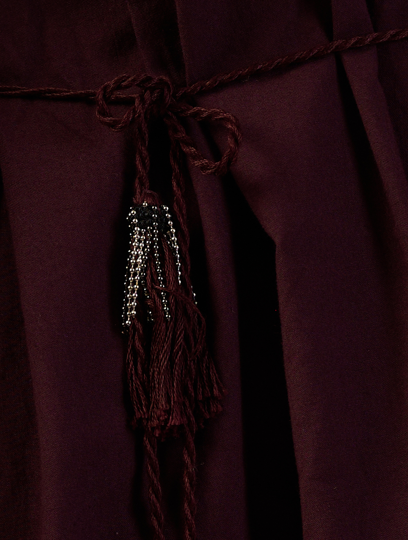 Close-up of a Coca Cola fabric with a tassel detail  | Women Dresses | Pret Clothes | nEo Clothes.