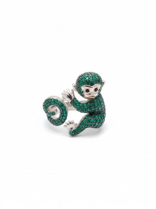  Green gemstone-encrusted sculptural monkey ring with whimsical detailing and polished silver accents – artistic statement ring by Near Earth Object.