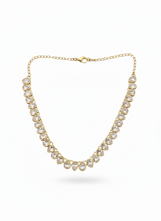 Gold statement necklace with double-row teardrop crystals arranged in a cascading symmetrical pattern – luxury bridal jewellery by Near Earth Object.