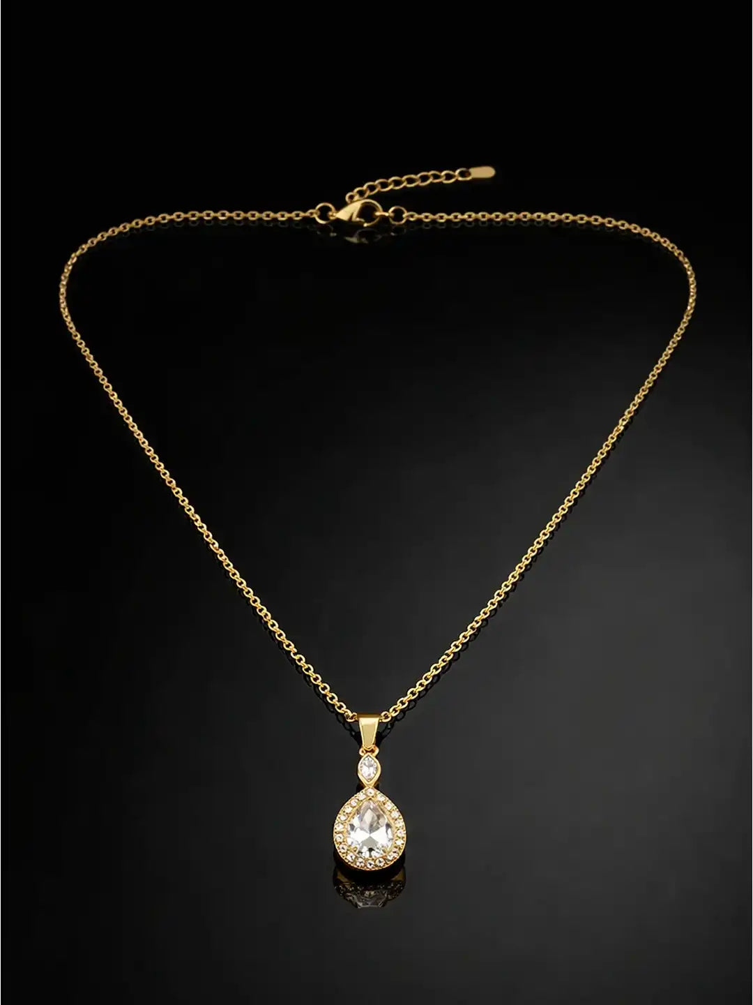Gold necklace with a teardrop-shaped pendant 