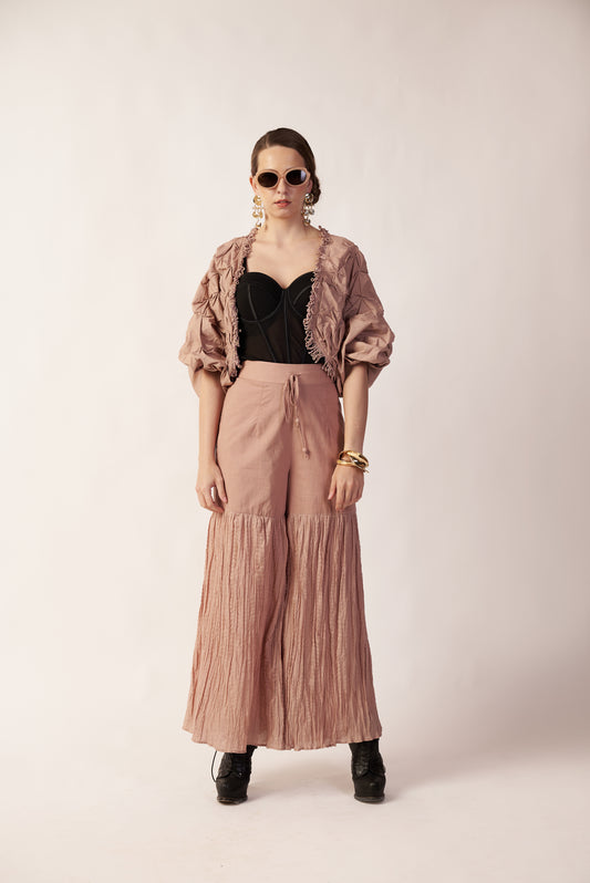 Stellar Flare Pant : Woman wearing a black top, beige shrug, and long beige pant - near Earth object | Women's Pants | Bottoms | Pret Clothes | nEo Clothes.
