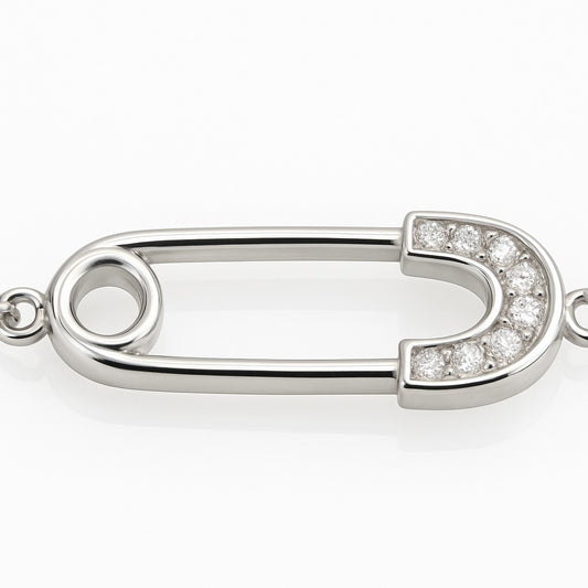 Detail view of silver safety-pin bracelet with crystal embellishment – contemporary punk-inspired jewellery by Near Earth Object.
