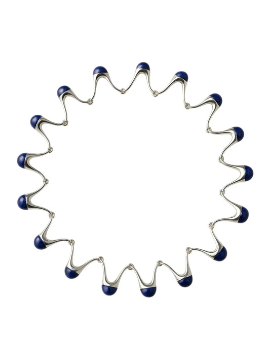 Sculptural wavy necklace with blue enamel tips and fluid design – artistic modern jewellery by Near Earth Object.