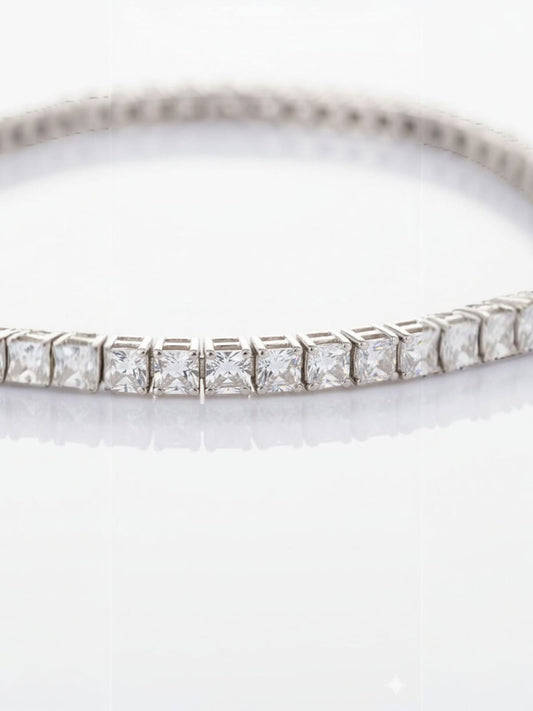 Close-up of silver bracelet showing square faceted crystals arranged in seamless linked settings — refined crystal jewellery by Near Earth Object.