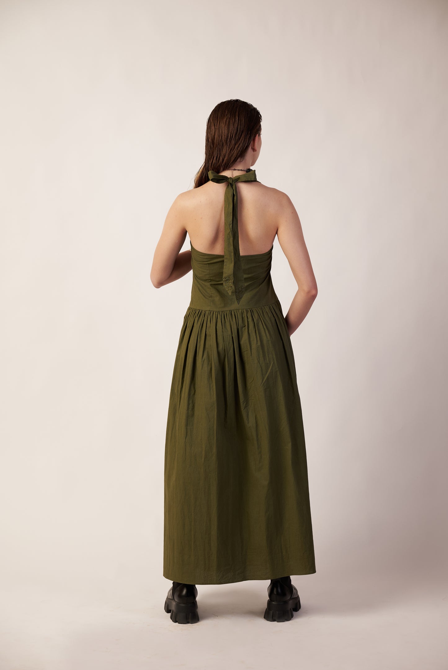 Woman wearing a Military green dress standing  | Women Dresses | Pret Clothes | nEo Clothes.