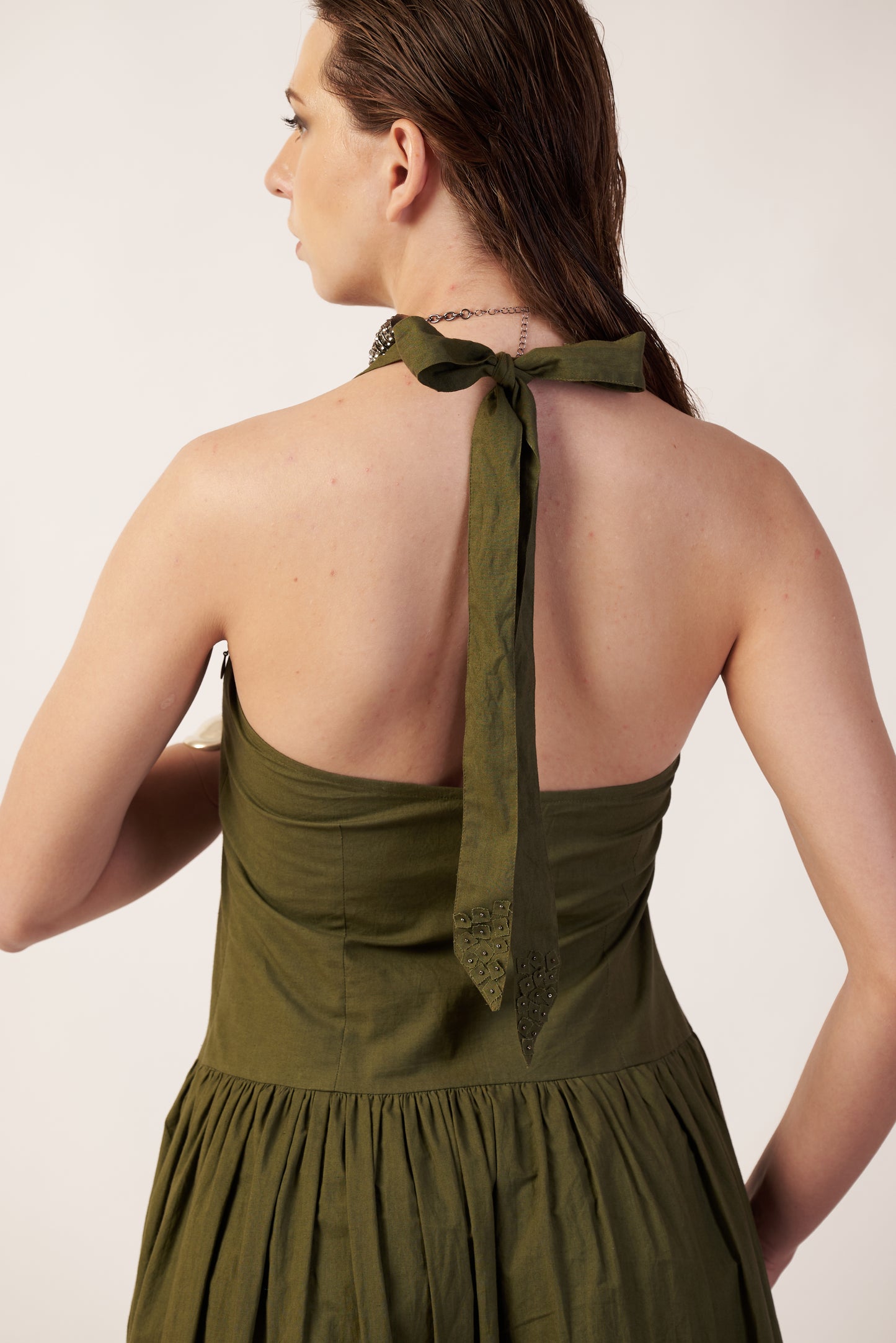 Woman wearing an Military green dress with a bow detail  | Women Dresses | Pret Clothes | nEo Clothes.