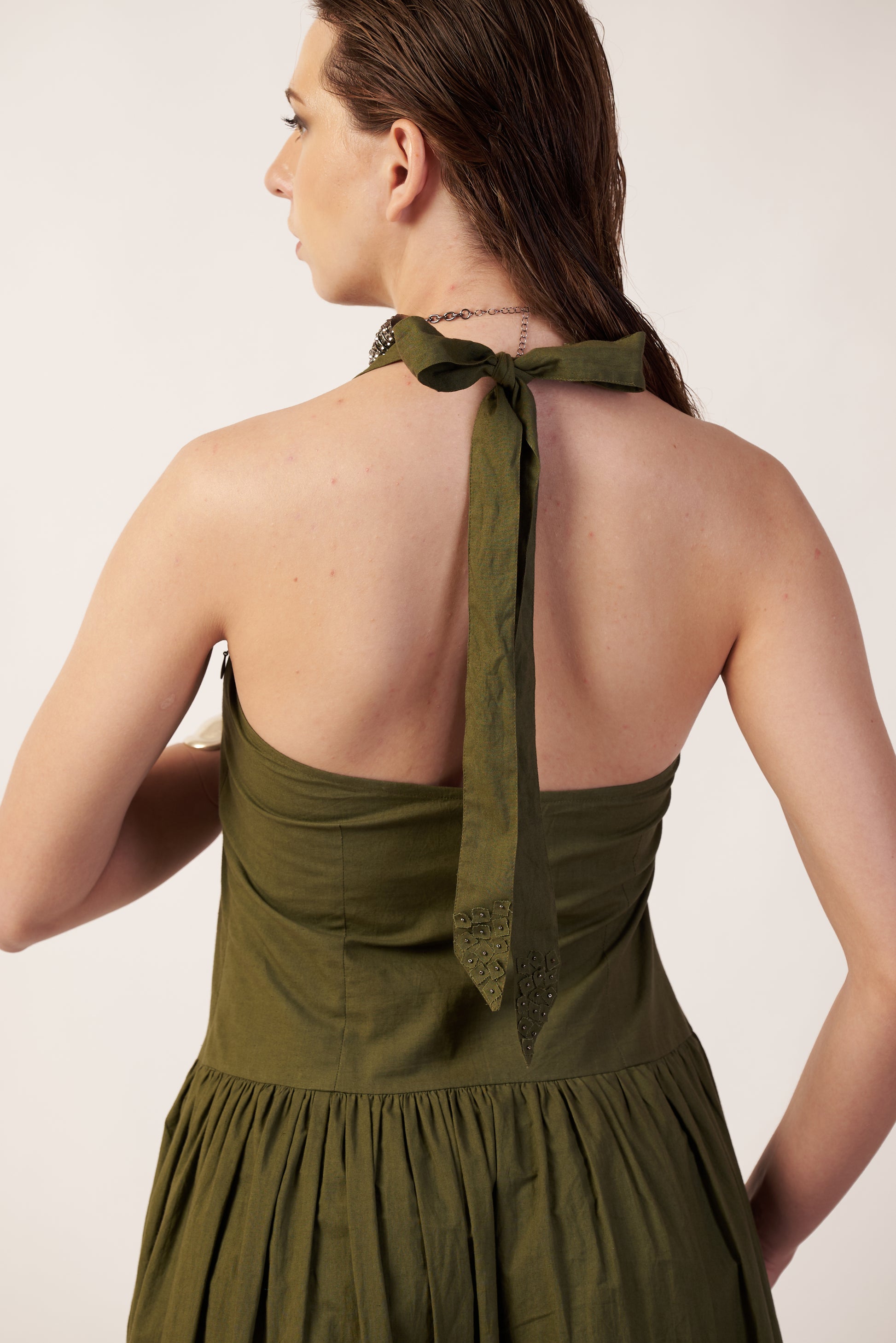 Woman wearing an Military green dress with a bow detail  | Women Dresses | Pret Clothes | nEo Clothes.
