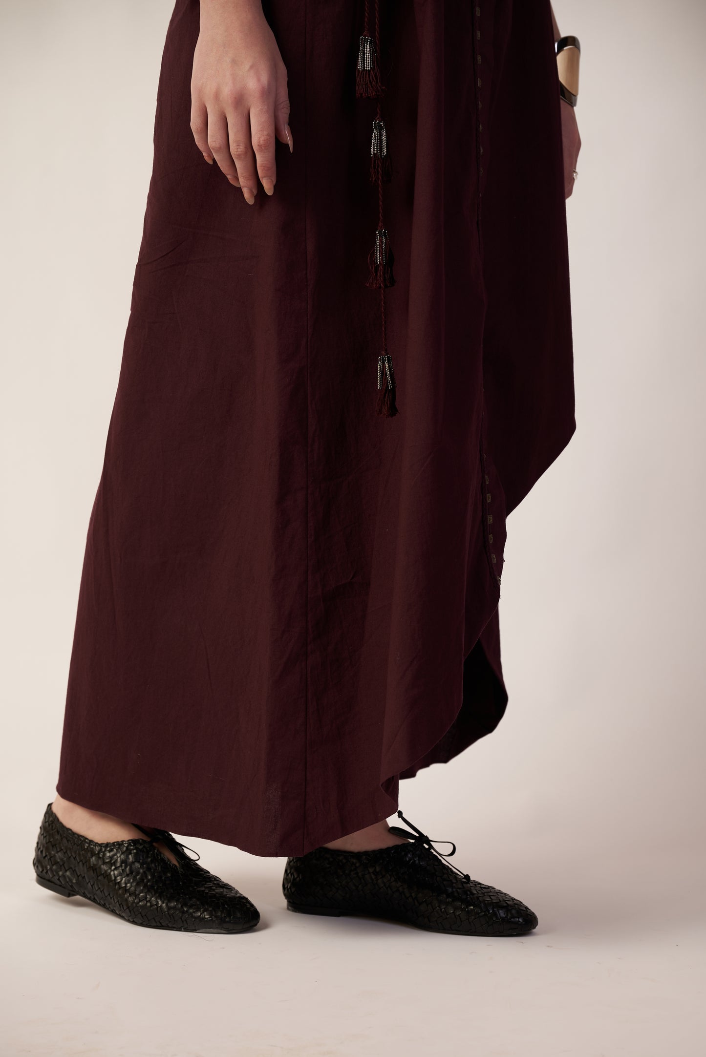 Person wearing a long Coca Cola dress with black shoes | Women Dresses | Pret Clothes | nEo Clothes.