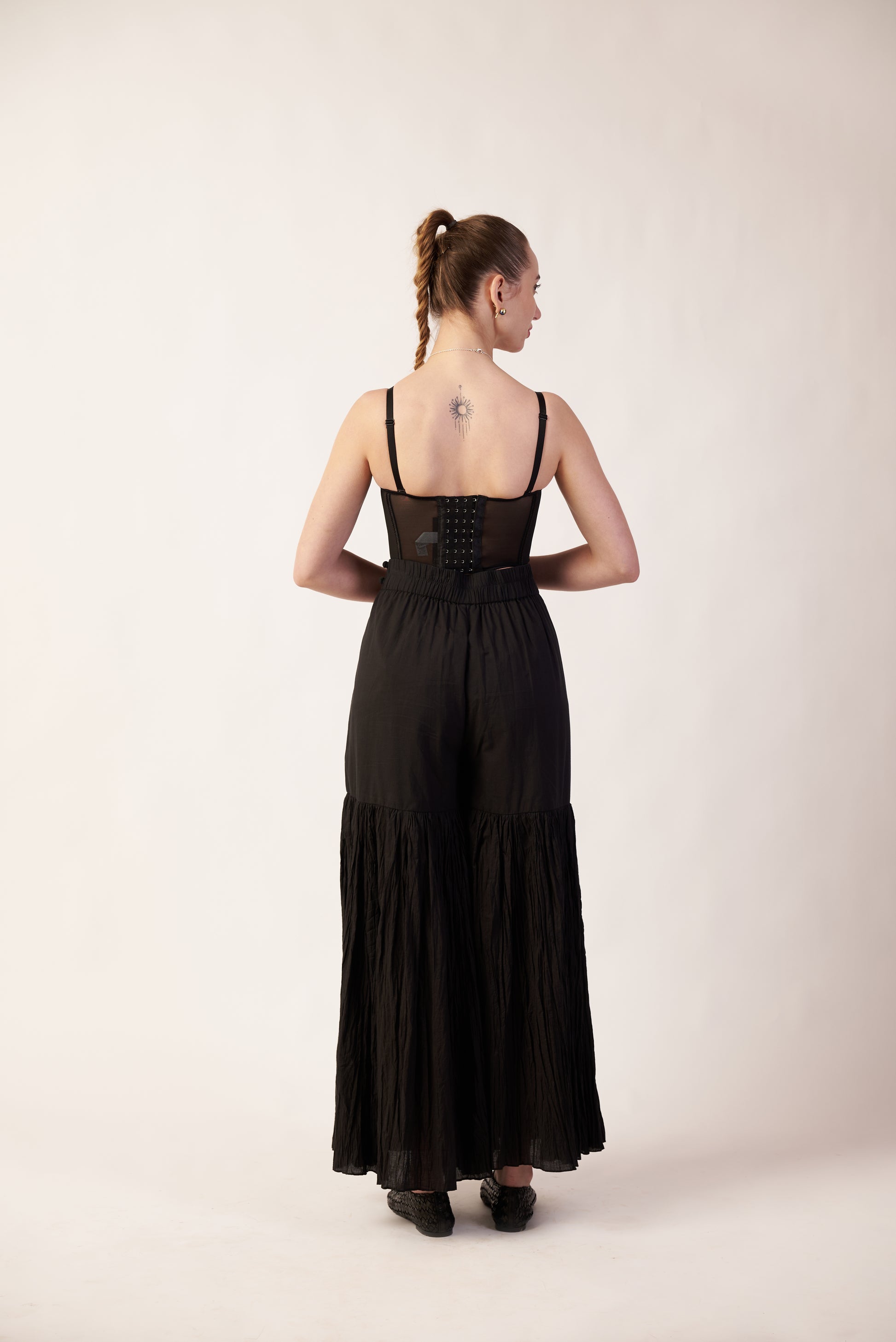 Woman wearing a black pant with top  | Women's Pants | Bottoms | Pret Clothes | nEo Clothes.