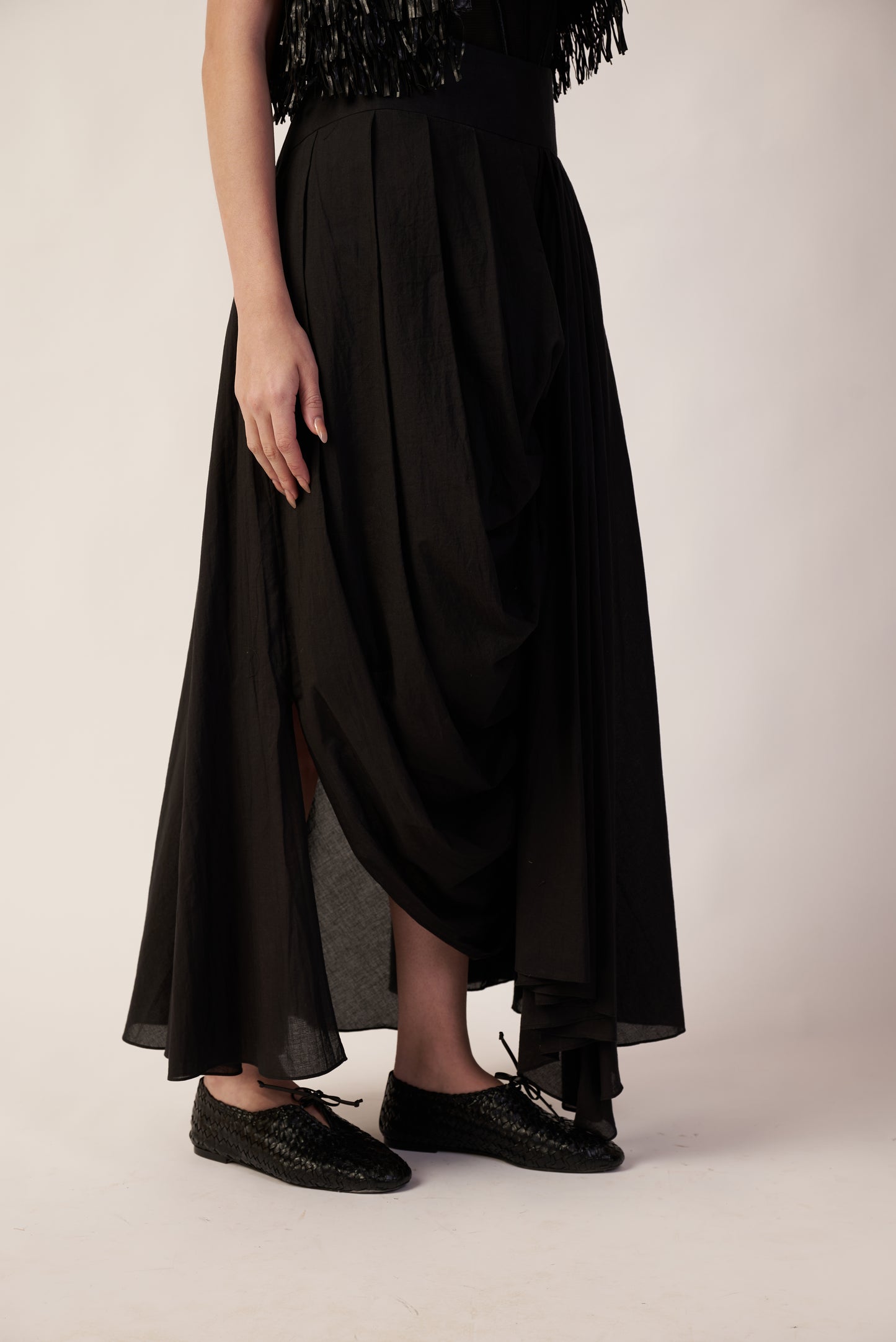 Black draped design pant worn by a person  | Women's Pants | Bottoms | Pret Clothes | nEo Clothes.